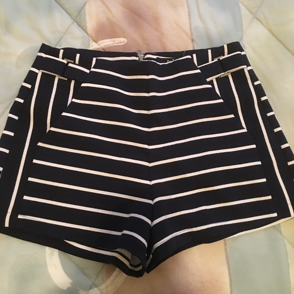 3 shorts and 4 shirts
